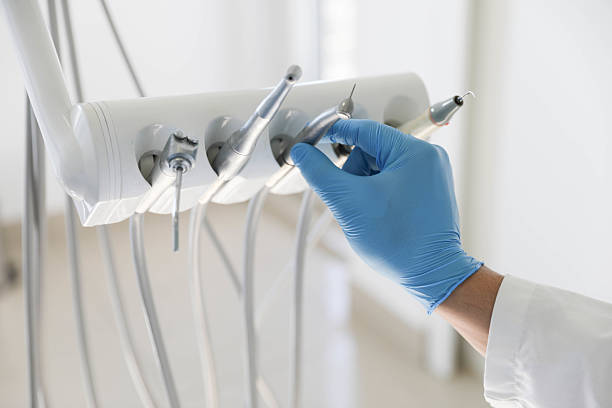 Professional Tooth Extraction technician working in Lonoke County County, AR